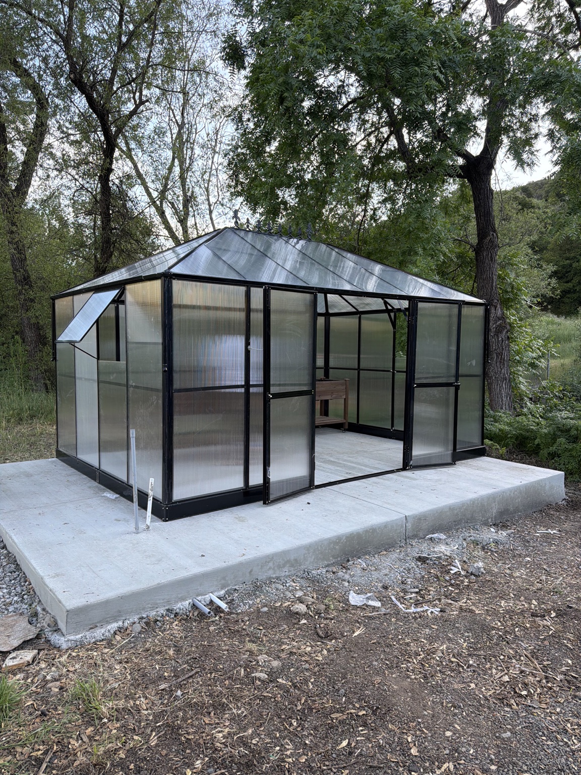 Disassembleable storage unit installed on a concrete slab